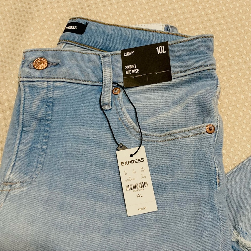 Express Curvy Mid Rise Light Wash Ripped Skinny Jeans - Picture 2 of 7
